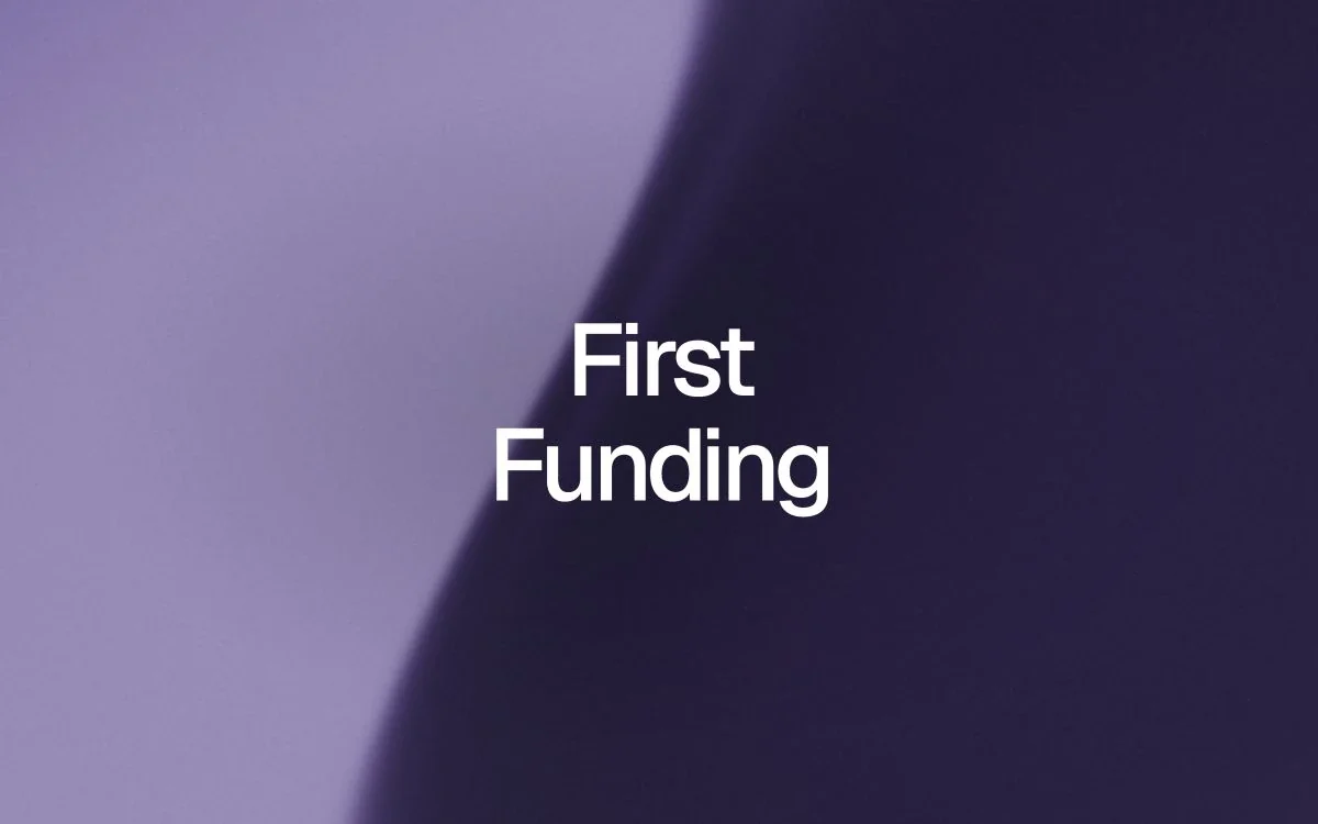 A flowing lavender, iris and deep indigo mesh gradient with the words First Funding in white.